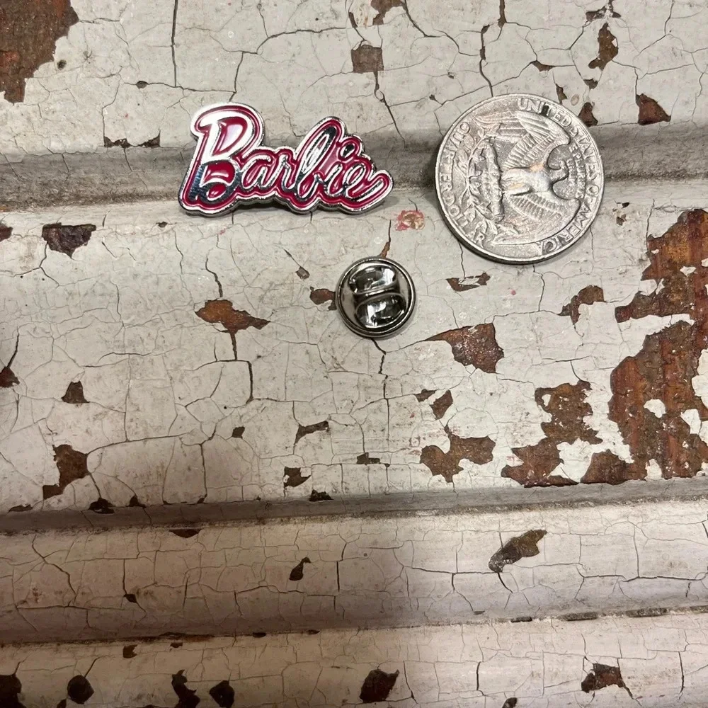 Brand new Barbie signature silver/pink enamel pin